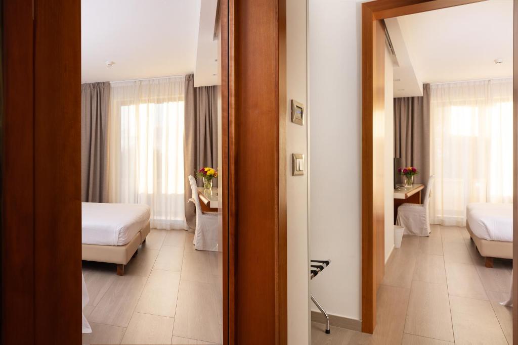 Bari62NP24-camera-doppio-ambiente-1